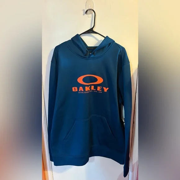 Oakley NWOT Blue Hoodie with Orange Logo - Picture 1 of 4
